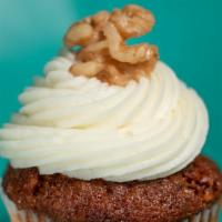 Carrot Cake · Topped with cream cheese frosting.