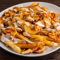 Loaded Fries · Fries with peri seasoning topped with shredded chicken, garlic and BBQ sauce drizzle.