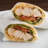 Pita Wrap · Toasted pita filled with shredded chicken, lettuce, tomato, onion and mayonnaise sauce