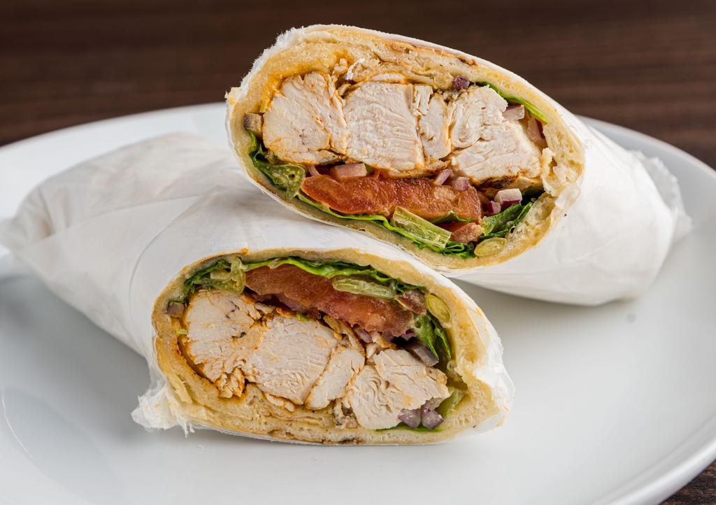 Pita Wrap · Toasted pita filled with shredded chicken, lettuce, tomato, onion and mayonnaise sauce
