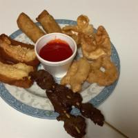 Pao Pao Platter · For two. Egg roll, cheese rangoon, fried shrimp, beef teriyaki and shrimp toast.
