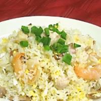 Rc11. Yang Chow Style Fried Rice · authentic style combination ( BBQ pork, shrimp and chicken)  fried rice with seasoning ( wit...