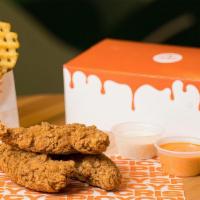 Fuku Fingers Meal · Crispy 3-piece jumbo chicken tenders. Comes with waffle fries, drink, pickles, 2 sauces of y...