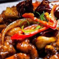 Cashew Nuts Chicken · Stir-fried chicken with cashew nuts, onion, carrots, broccoli dried chili, and smoked chili ...