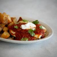 Huevos Rancheros- · Grilled Corn Tortillas Stacked With Our House Made Black Beans, Mozzarella Cheese, And House...