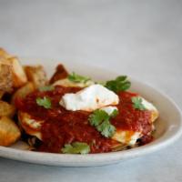 Gf Huevos Rancheros. · Grilled Corn Tortillas Stacked With Our House Made Black Beans, Mozzarella Cheese, And House...