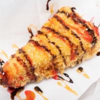 Fried Cheesecake · Fried cheesecake w strawberry sauce.