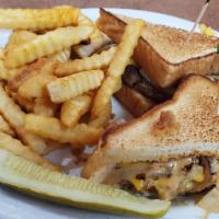 Patty Melt · Single beef patty, american cheese, grilled onions, and chipotle sauce on a grilled texas to...