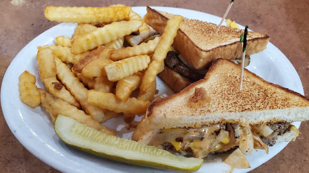 Patty Melt · Single beef patty, american cheese, grilled onions, and chipotle sauce on a grilled texas toast.