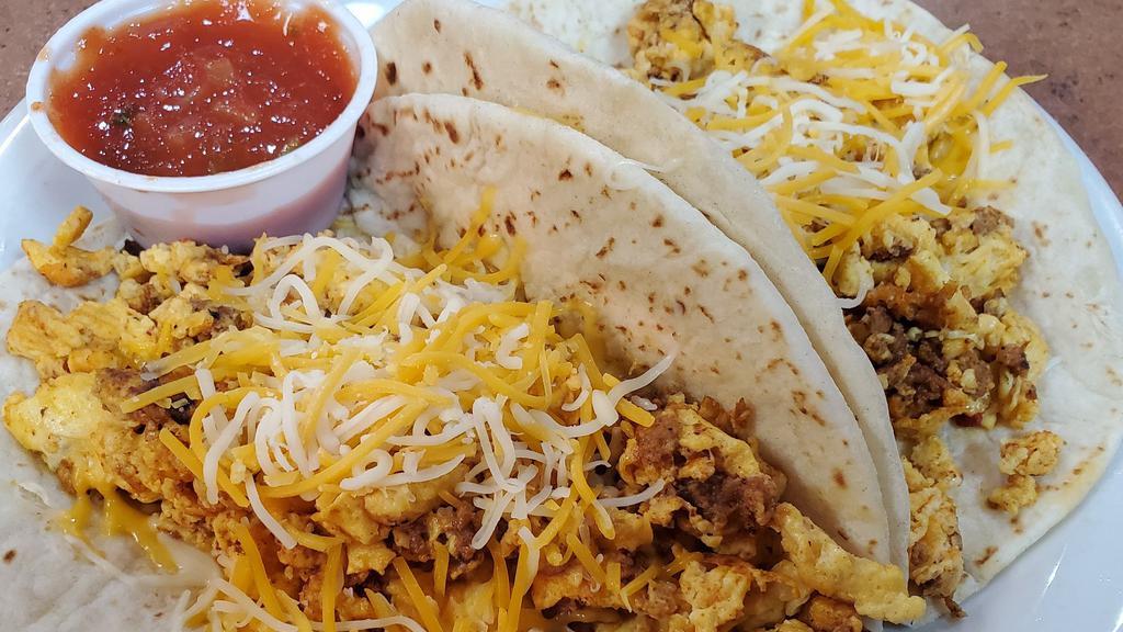 Breakfast Tacos · Choose from bacon, sausage, ham, chorizo or potato with egg and cheese