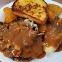 Hamburger Steak · Smothered with grilled onions and mushrooms and brown gravy