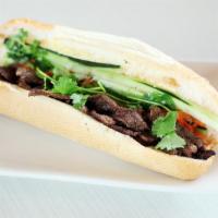 Grilled Pork Sandwich - Banh Mi Heo Nuong · Mayonnaise, carrot, radish pickle, cucumber, cilantro, and jalapeno