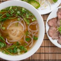 Filet-Mignon Pho - Pho Filet Mignon · Rice noodles with tasty beef broth, green onion, cilantro, and red onion. Each bowl of pho i...