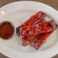 Bbq Spare Ribs (4) · Spare ribs braised Chinese BBQ sauce and roasted to perfection.