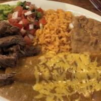 #10 Tampiquena · Your choice of meat, with 1 cheese enchilada. Served with rice, beans, guacamole, lettuce, p...