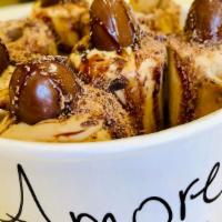 Amore Caffe · Amore coffee ice cream, pirouline, chocolate shavings, chocolate almonds.