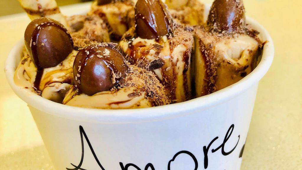 Amore Caffe · Coffee ice cream, pirouline, chocolate shavings, chocolate almonds.
