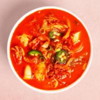 Kimchi Stew · Rich stew made with kimchi, tuna, scallions, onions, and diced tofu.