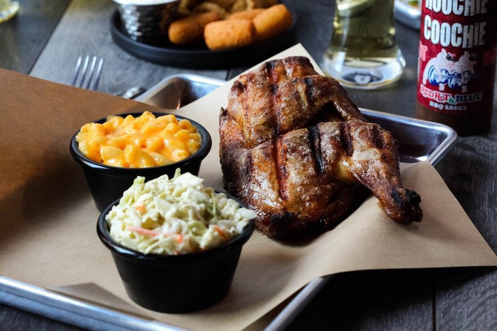Memphis Half Chicken Plate · Hickory-smoked 2-3 hrs, bone-in, served with two Southern Sides.. Add a Garden or Caesar Side Salad to your meal! (found in the Salad Menu)