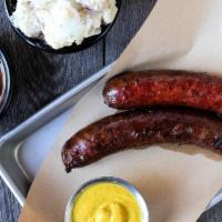 Smoked Sausage Plate · Two links, hickory-smoked,. with sautéed onions and spicy mustard.. Add a Garden or Caesar S...