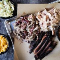 Tennessee Triple · Choose three smoked meats, served with two Southern Sides. Add a Garden or Caesar Side Salad...