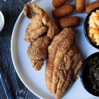 Delta Catfish Plate · Two fillets, hand-breaded & crispy-fried with a side of tartar sauce.  Served with two Sides...
