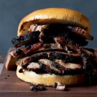 Texas Brisket Sandwich · Tender and sliced-to-order  with a side of Mojo Mild sauce. Served with one Southern Side.  ...