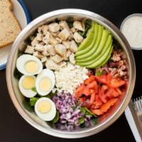 Cobb Salad · Romaine, tomatoes, onions, eggs, feta cheese, bacon, avocado, plain chicken.
