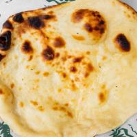 Butter Naan · no description needed , for this fluffy flat bread cooked in an unique Oven called Tandoor, ...