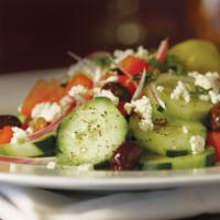 Cucumber & Feta Salad · Sliced cucumber with feta cheese, roma tomatoes, red onions, kalamata olives, and garlic, to...