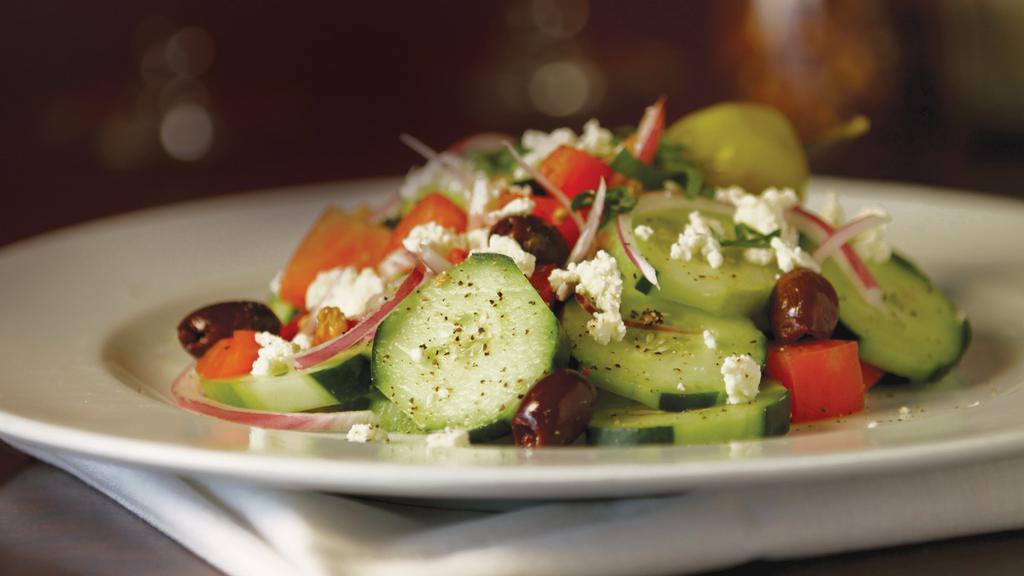 Cucumber & Feta Salad · Sliced cucumber with feta cheese, roma tomatoes, red onions, kalamata olives, and garlic, tossed with Sicilian extra virgin olive oil. 380 cal.