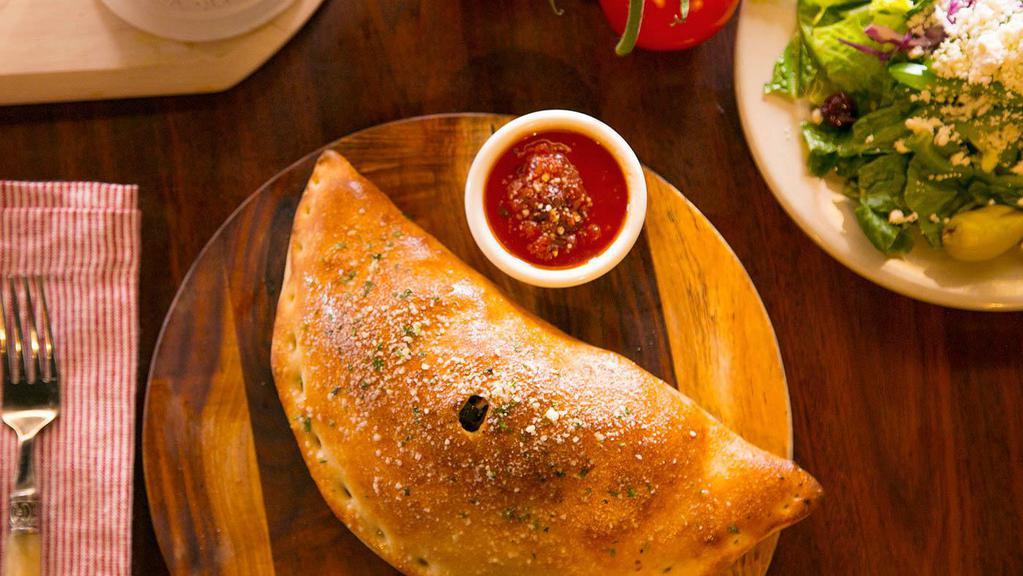 Create-Your-Own Calzone · Up to three toppings of your choice. We’ll add the mozzarella. 920-1680 cal.