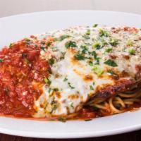 Chicken Parmesan · Spaghetti smothered with our authentic red gravy, topped with breaded chicken covered in moz...