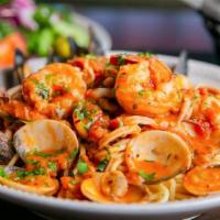 Pasta Di Mare · Sautéed shrimp, clams, mussels and calamari, swirled in a spicy Pinot Grigio marinara sauce,...