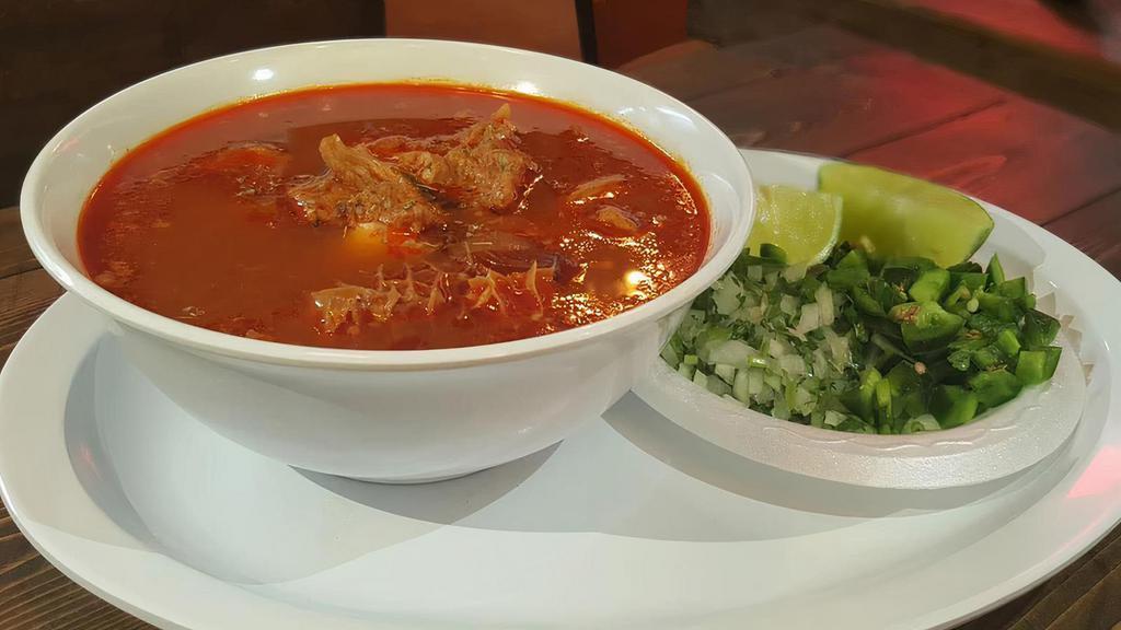 Menudo · Beef tripe, pork feet, Mexican hominy with onions, jalapenos, cilantro and three tortillas.