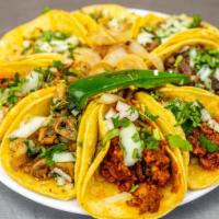 Mini Tacos · Choice of meat, Onion, Cilantro.
