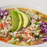 Ceviche Clasico · Fresh raw fish, shrimp or mixed. Marinated in lime juice then tossed with diced onions, cucu...