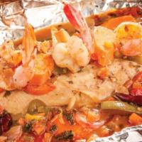 Seafood Al Vapor · 8 oz. fresh fish fillet and (3) jumbo shrimp wrapped in aluminum foil, with spices, tomatoes...