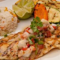 Grilled Fish Fillet · Fish fillet lightly seasoned and grilled, topped with sautéed crab meat. Served with grilled...