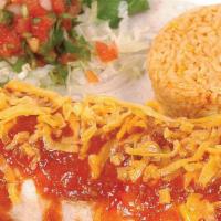 El Grande Burrito · Large flour tortilla filled with tender beef or chicken fajita, refried beans, and cheese, t...