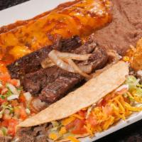El Gringo · Beef or chicken fajitas, (1) cheese enchilada, and (1) ground beef crispy taco. Served with ...
