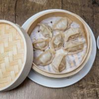 Steamed Dumplings (8Pc) · Pork with Chinese cabbage or beef with onions.