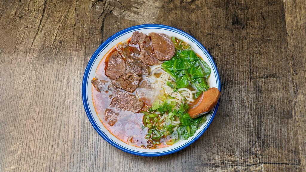 Beef Noodle Soup In Spicy Broth · Hot & spicy. Spinach, cilantro, green onion, daikon, sliced beef, and chili oil.