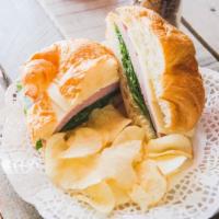 Ham & Cheese Croissant Sandwich · Delicious buttery croissant filled with ham, cheese and spinach. *Chips are not included, bu...