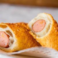 Jumbo Pig In A Blanket · Jalapeno sausage wrapped in a puff pastry.