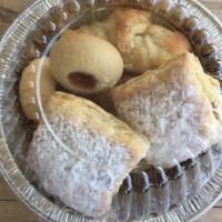 Guava Delights · Box including a great combination of mini puff pastries filled with cream cheese, guava past...