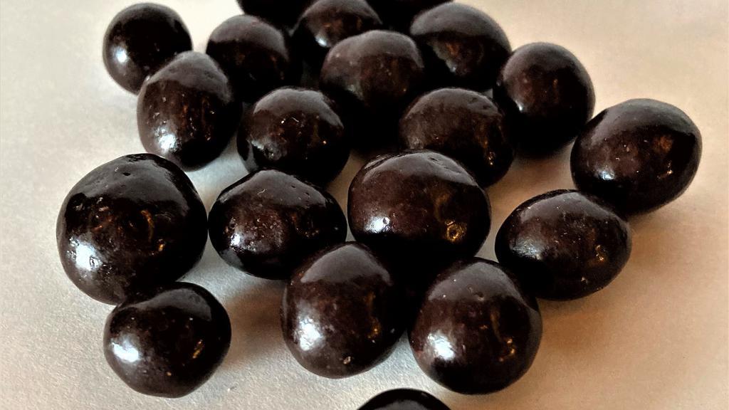 Dark Chocolate Covered Coffee Beans · Dark chocolate covered coffee beans.