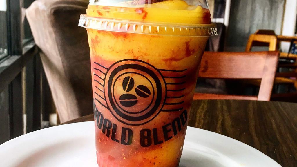 Mangonada · Sweet, tangy and spicy flavor combination of mango sorbet, Chamoy and Tajin (chili) sauces blended to perfection with ice. Diced mango and Tajin powder on top.