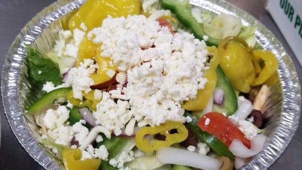 Greek Salad (Small Salad) · Iceberg, olives, feta, Greek peppers, tomatoes, onion, bell pepper, cheese.