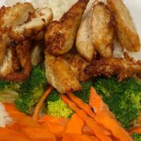 Teriyaki Chicken Bowl · Chicken breast, broccoli, carrots, and teriyaki sauce, over steamed rice.